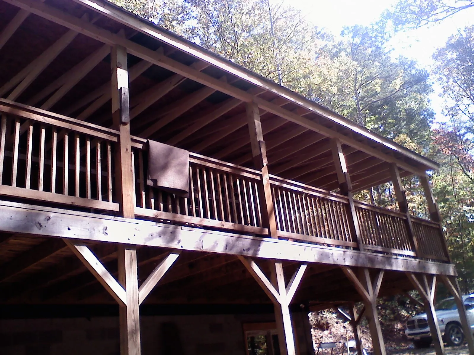 Timber framing under a new elevated porch and deck — Roof Leak Repair in Bayport by Roofing Brothers